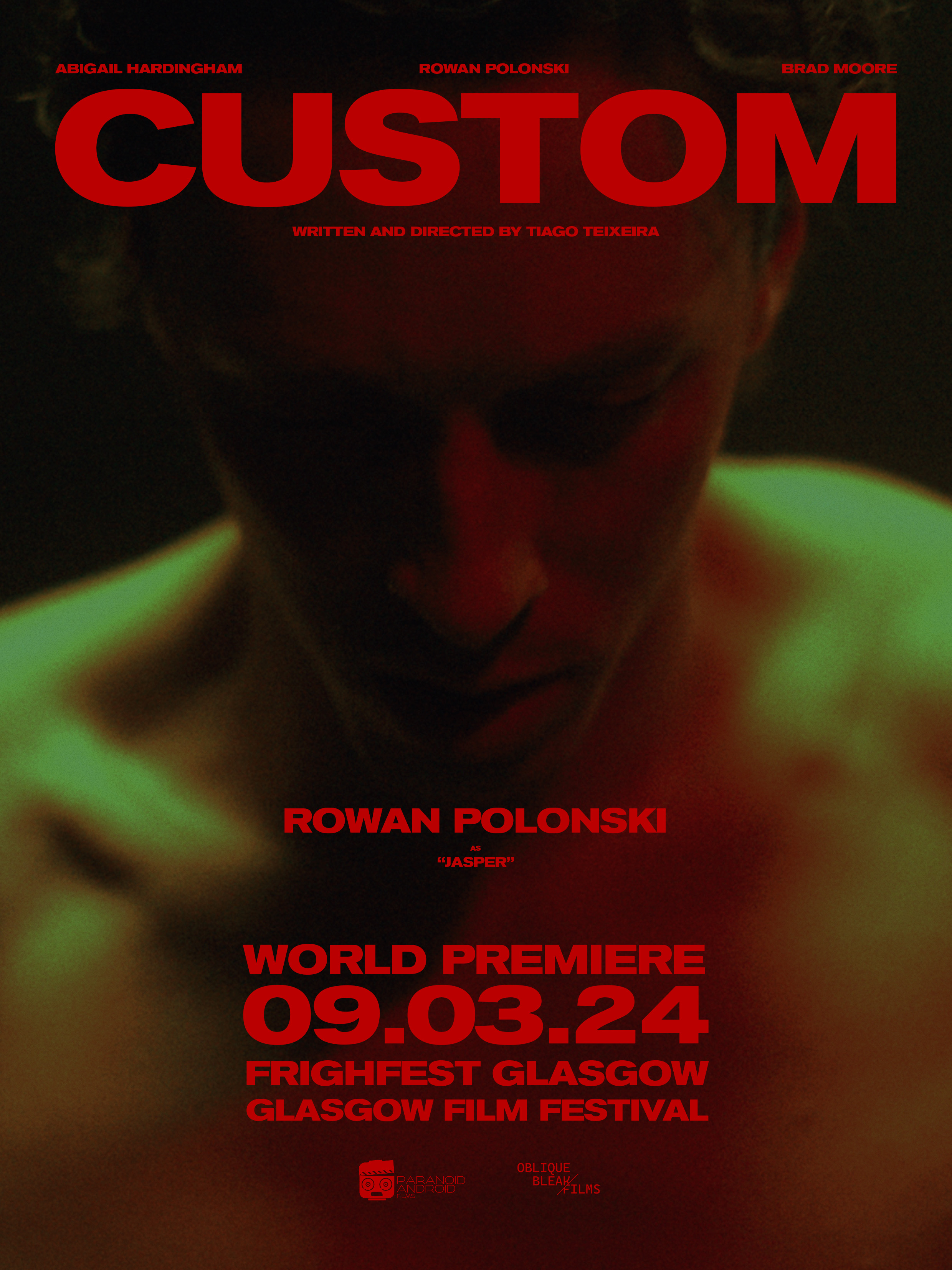 Graphic of a typography specimen showing the alphabet and numerals on top of a dark gray background.